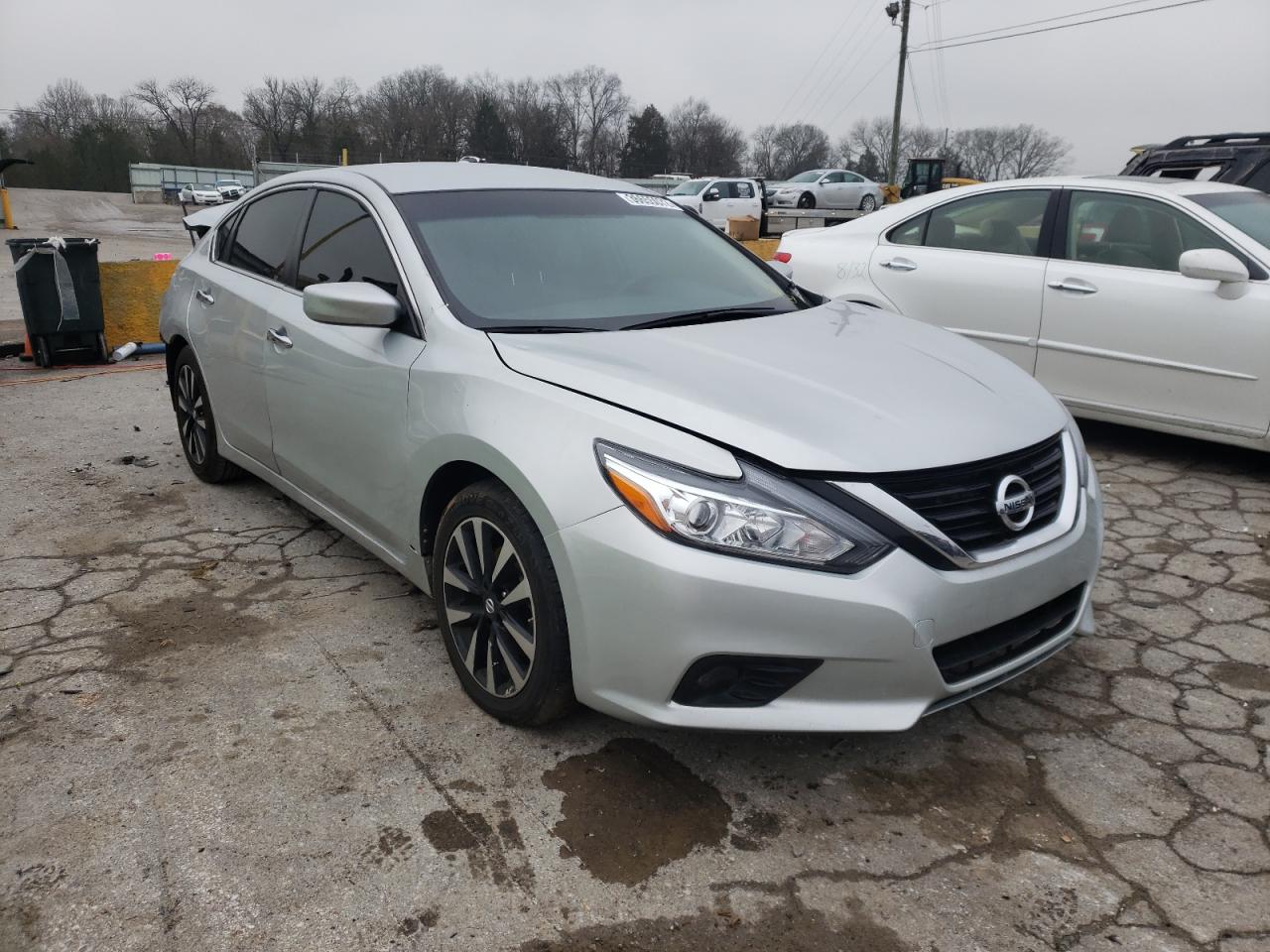 NISSAN ALTIMA 2018 with VIN 1N4AL3APXJC119303 - Photo from auction