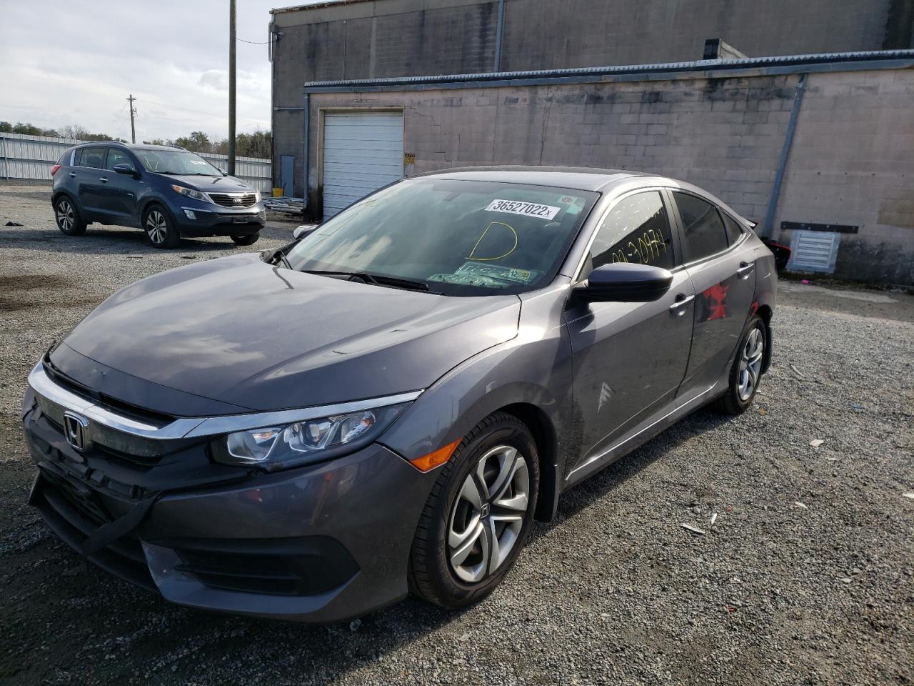 Photo 2 from auction – 2018 HONDA CIVIC LX with VIN 2HGFC2F5XJH516235
