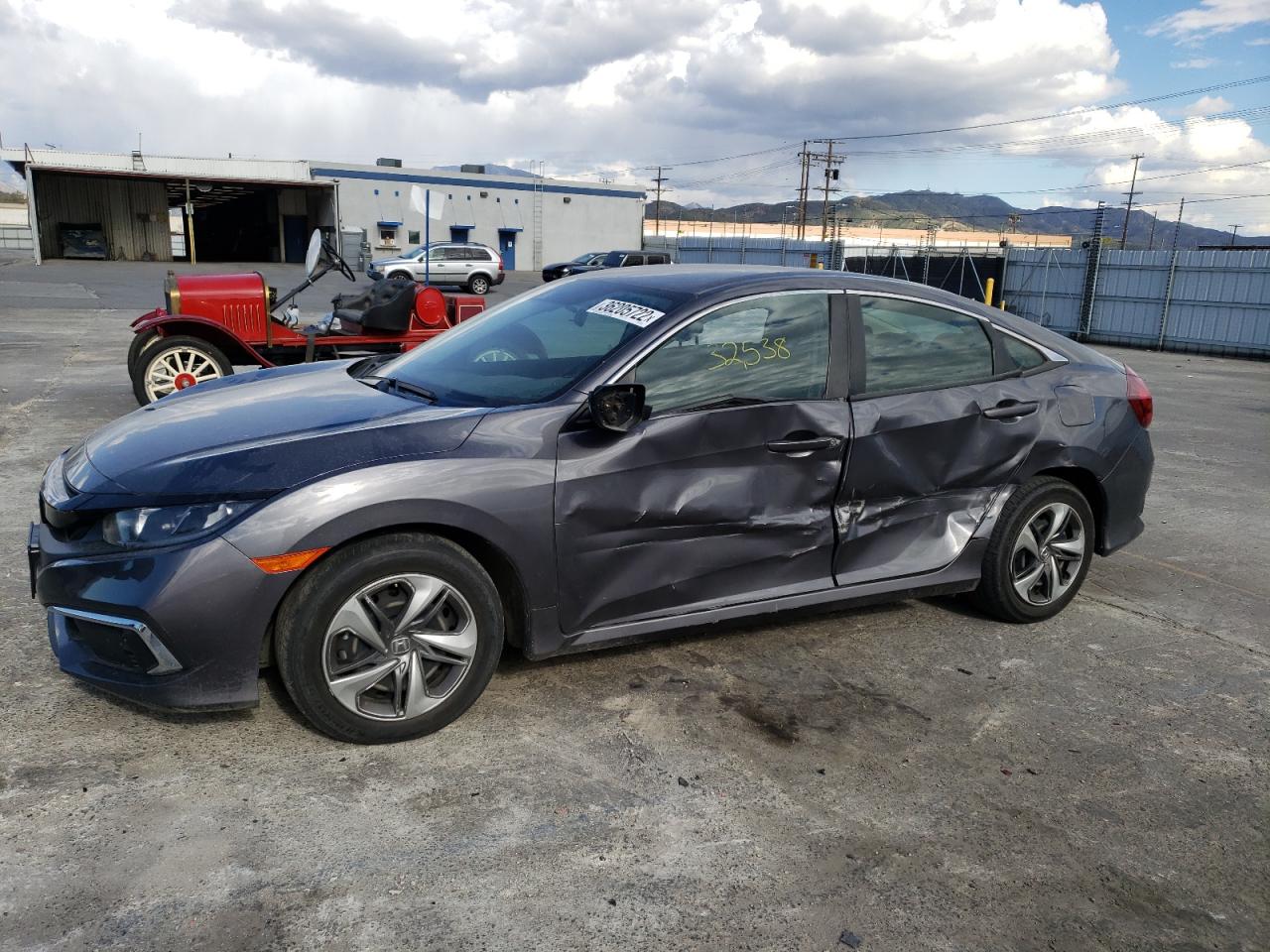 Photo 9 from auction – 2019 HONDA CIVIC LX with VIN 2HGFC2F66KH579035