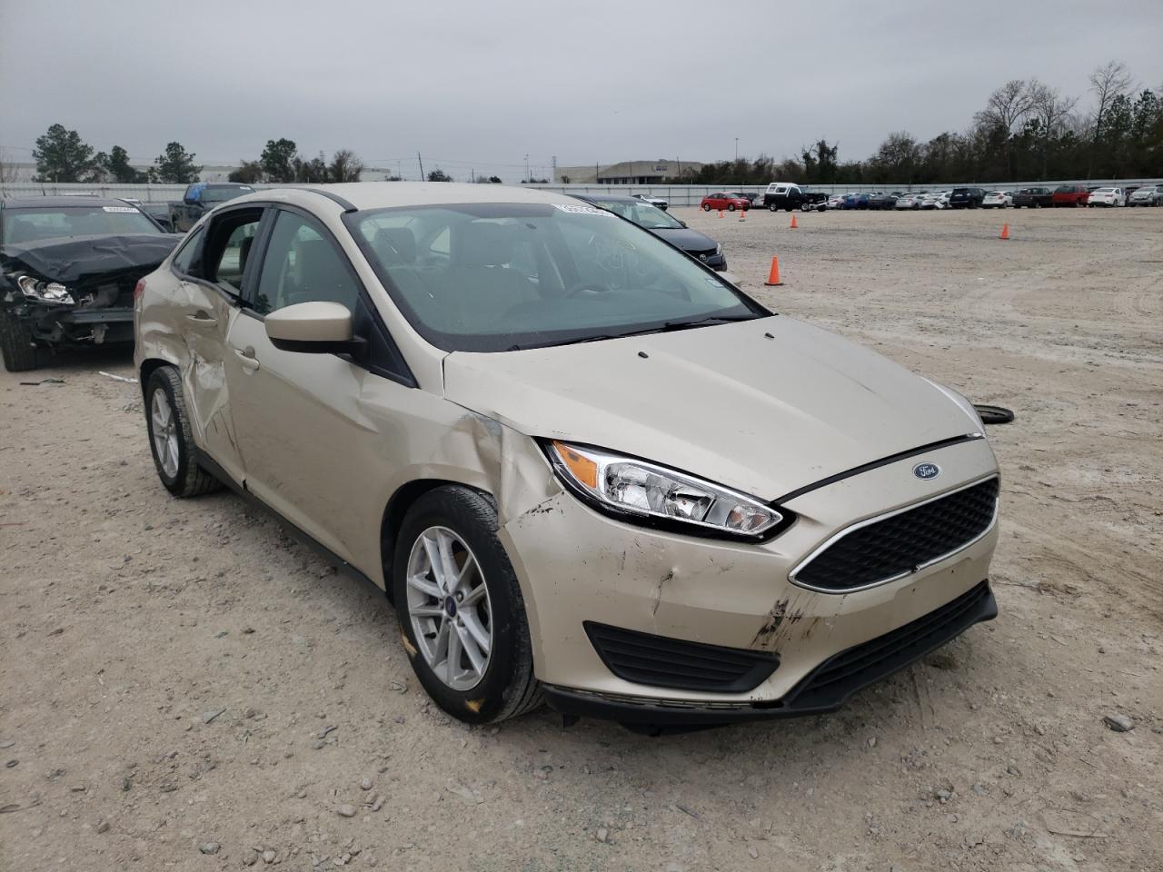 FORD FOCUS SE 2018 with VIN 1FADP3FE4JL216411 - Photo from auction