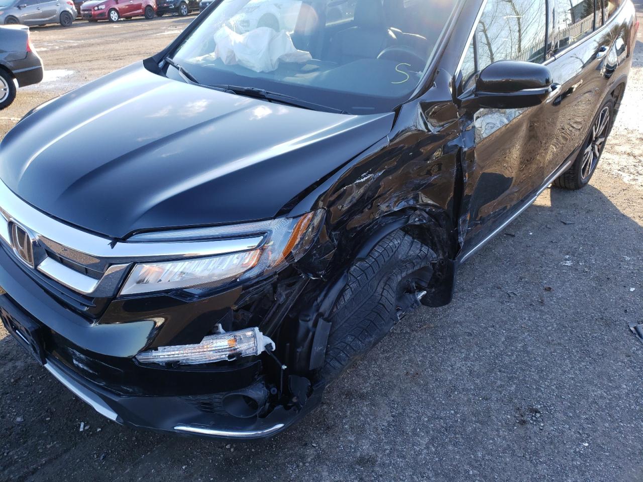 Photo 9 from auction – 2019 HONDA PILOT TOUR with VIN 5FNYF6H64KB503306