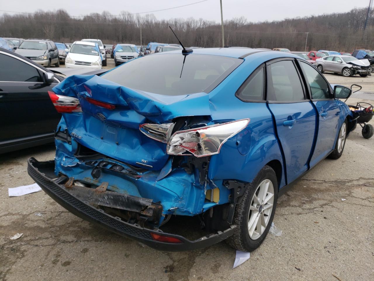 Photo 4 from auction – 2016 FORD FOCUS SE with VIN 1FADP3F24GL358983