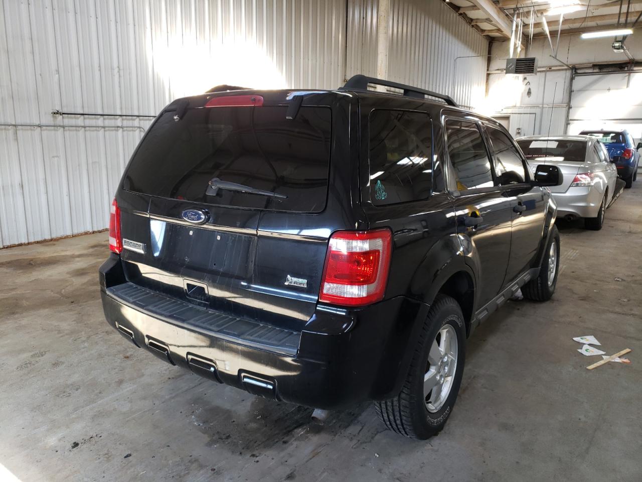 Photo 4 from auction – 2010 FORD ESCAPE XLT with VIN 1FMCU9DG0AKD31885