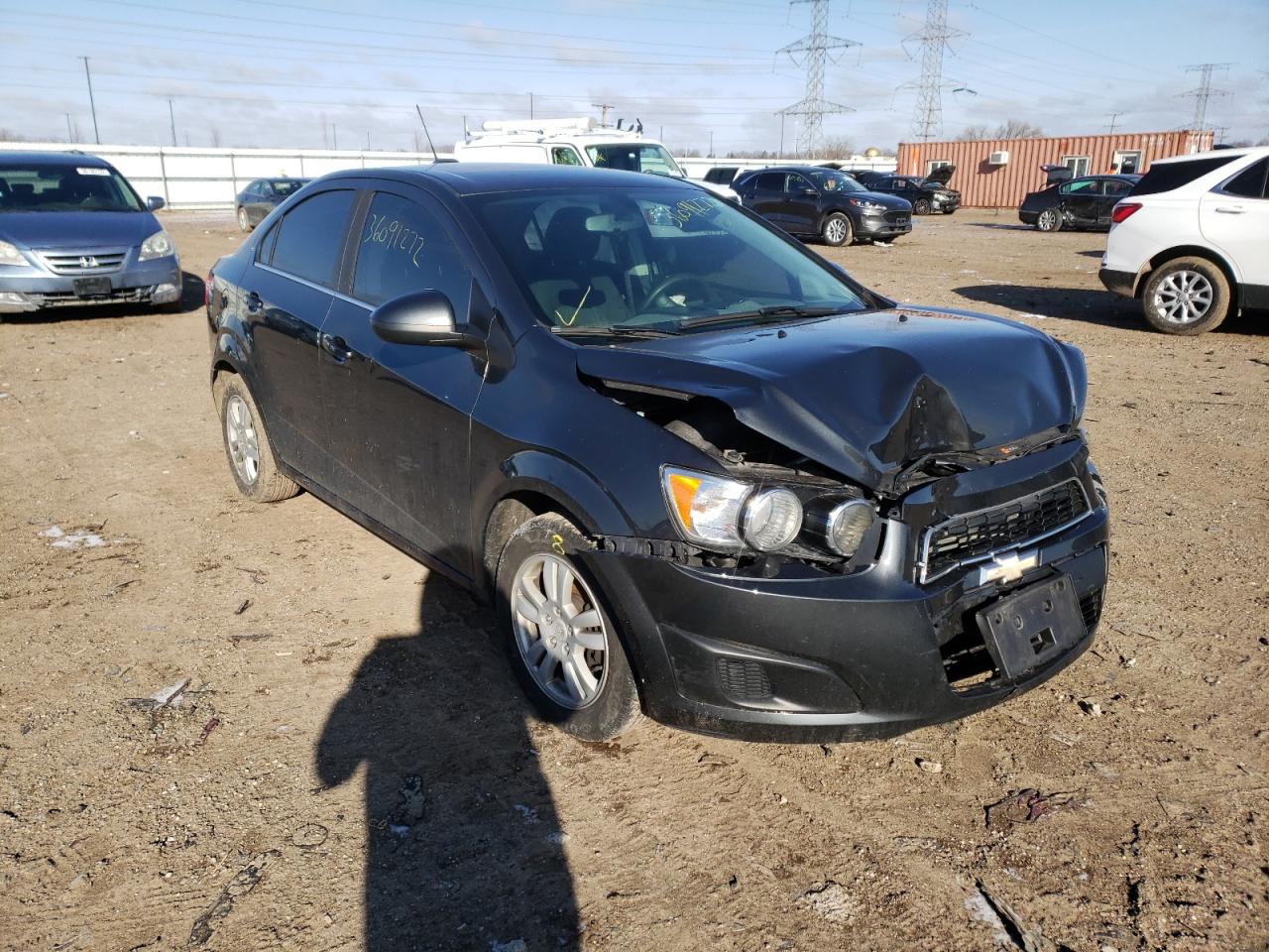 CHEVROLET SONIC LT 2015 with VIN 1G1JC5SH2F4142923 - Photo from auction