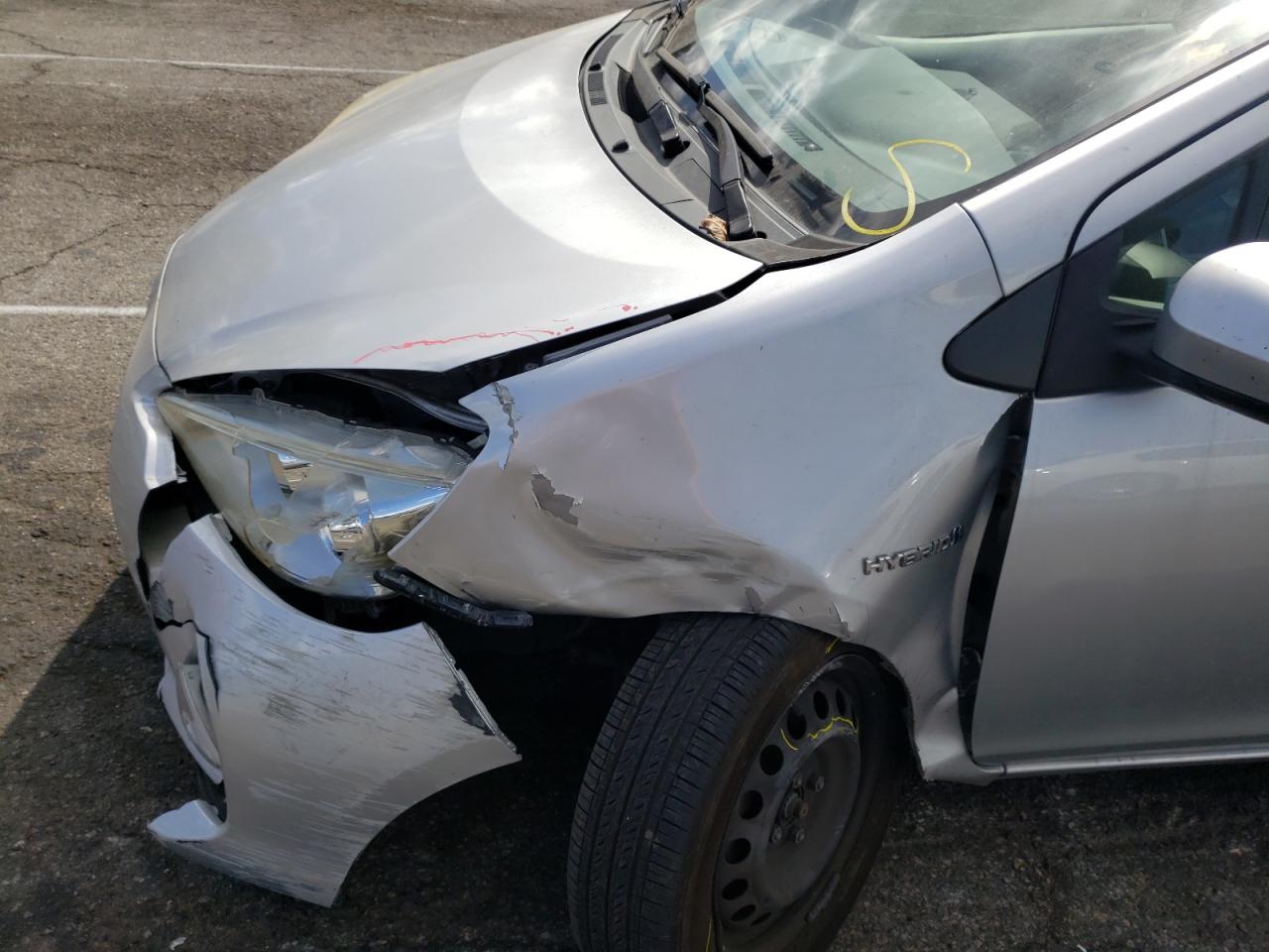 Photo 9 from auction – 2014 TOYOTA PRIUS C with VIN JTDKDTB35E1565951
