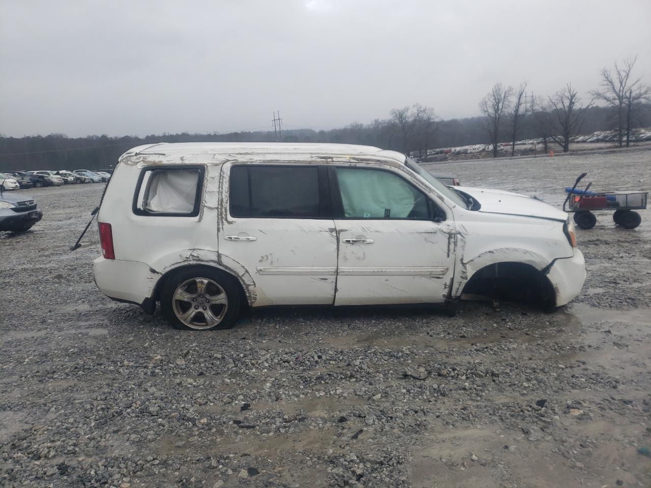 Photo 9 from auction – 2012 HONDA PILOT EX with VIN 5FNYF3H43CB036149
