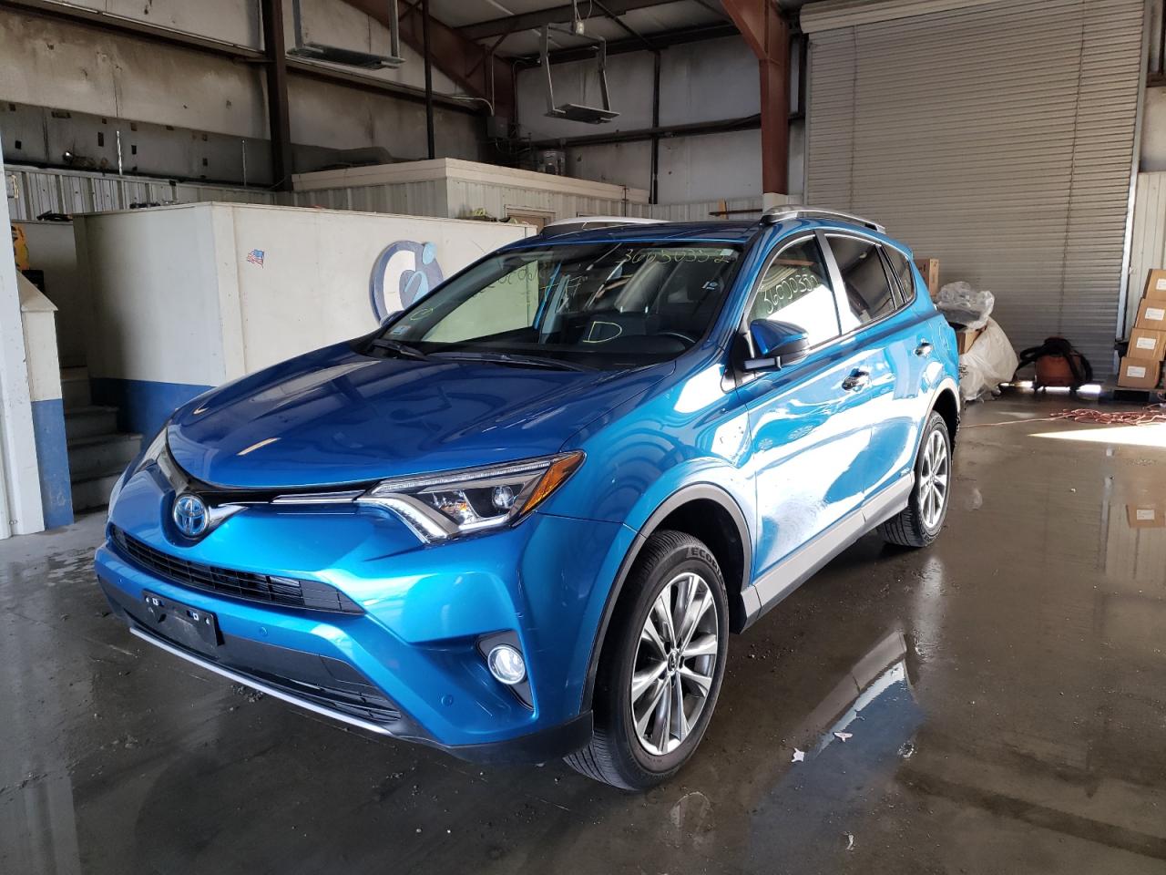Photo 2 from auction – 2018 TOYOTA RAV4 HV LI with VIN JTMDJREV7JD199646
