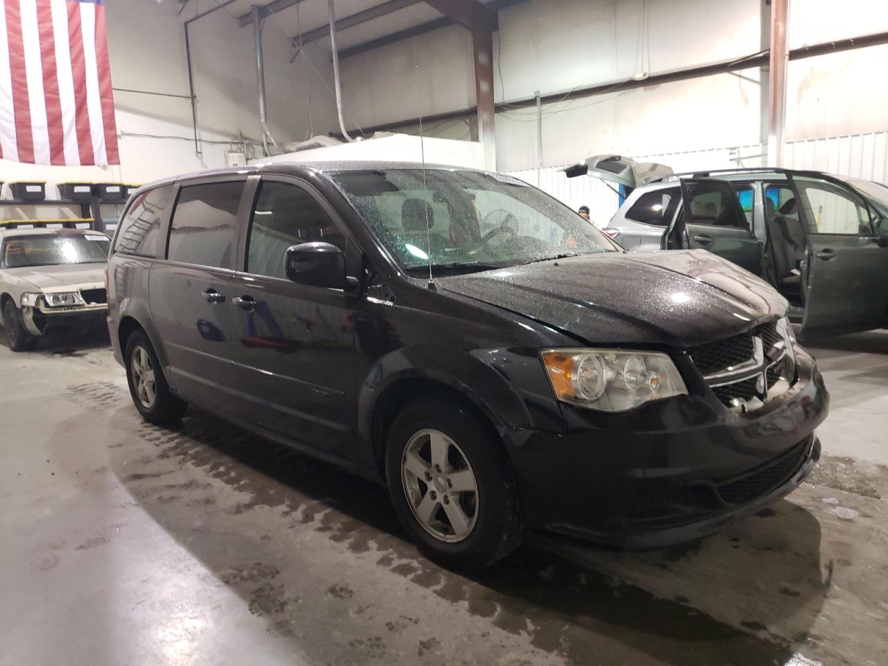 DODGE GRAND CARA 2013 with VIN 2C4RDGCG8DR521640 - Photo from auction