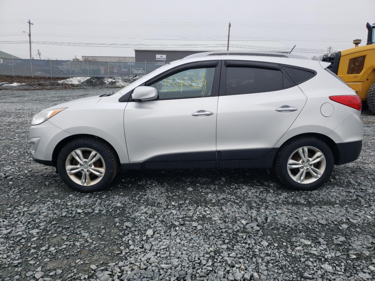 Photo 9 from auction – 2012 HYUNDAI TUCSON GLS with VIN KM8JUCAC7CU400973