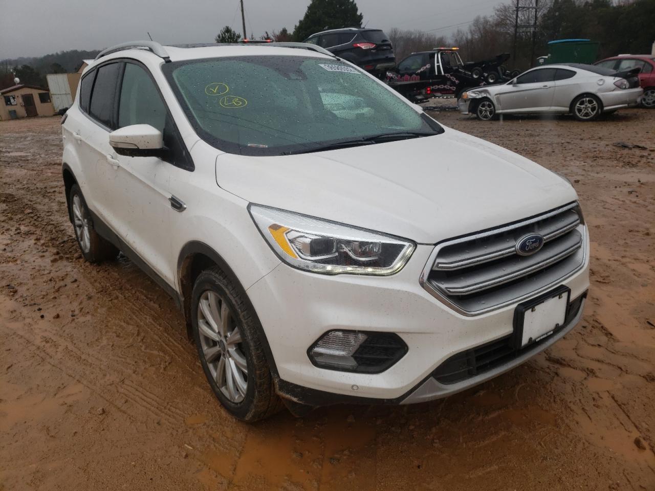 FORD ESCAPE TIT 2017 with VIN 1FMCU9J9XHUB11884 - Photo from auction