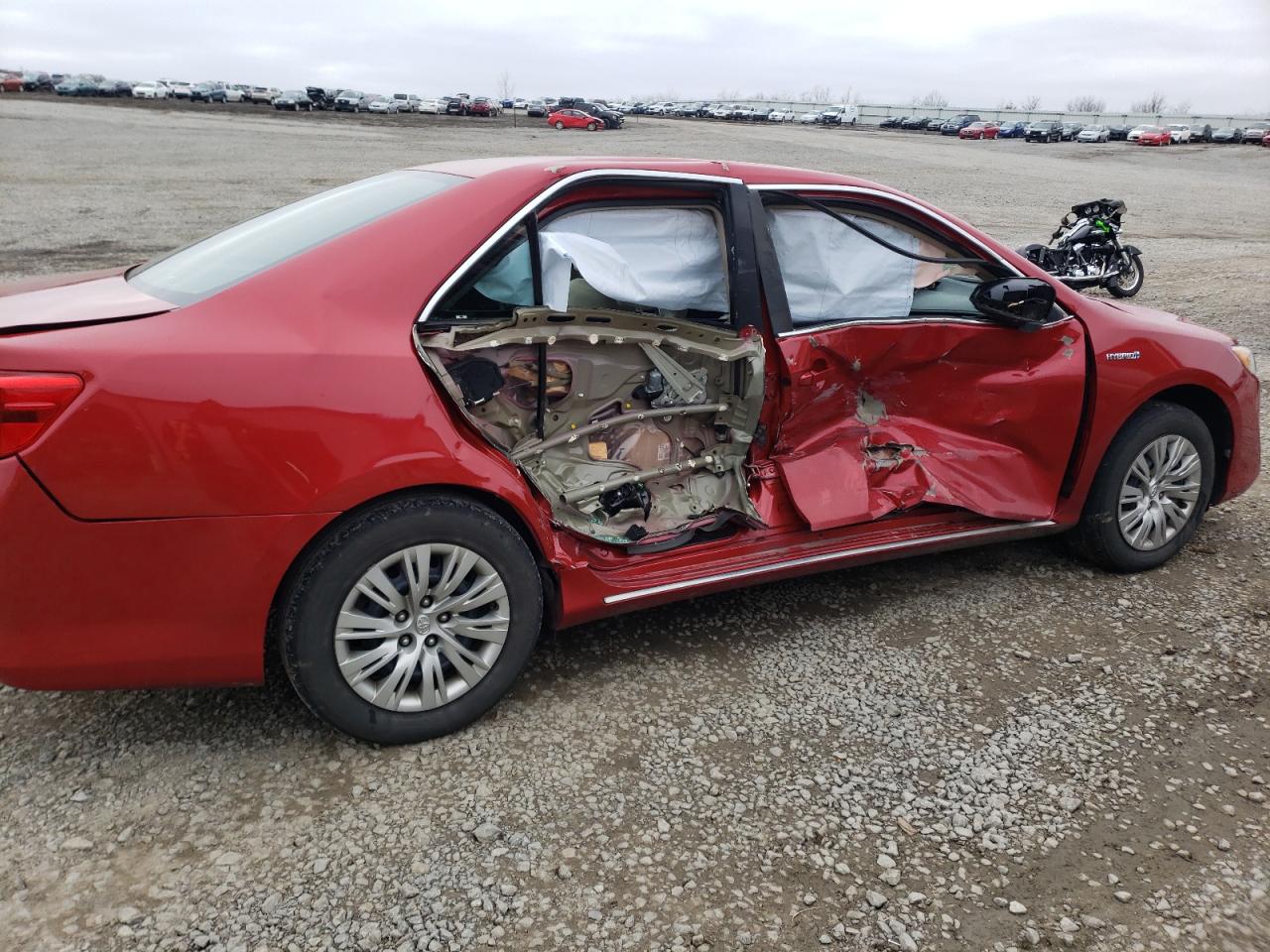 Photo 9 from auction – 2012 TOYOTA CAMRY HYBR with VIN 4T1BD1FK7CU031475