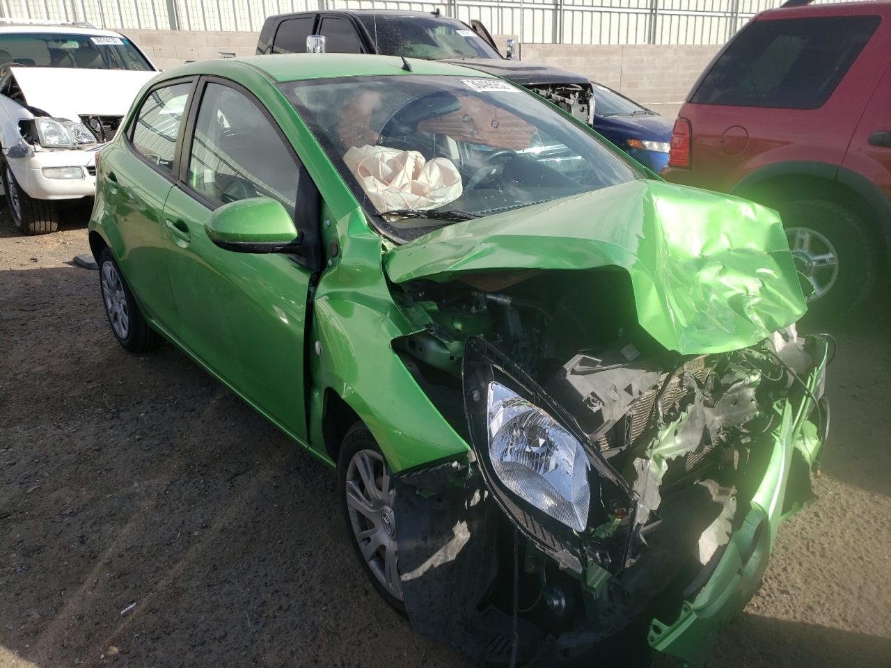 MAZDA MAZDA2 2012 with VIN JM1DE1KYXC0149578 - Photo from auction