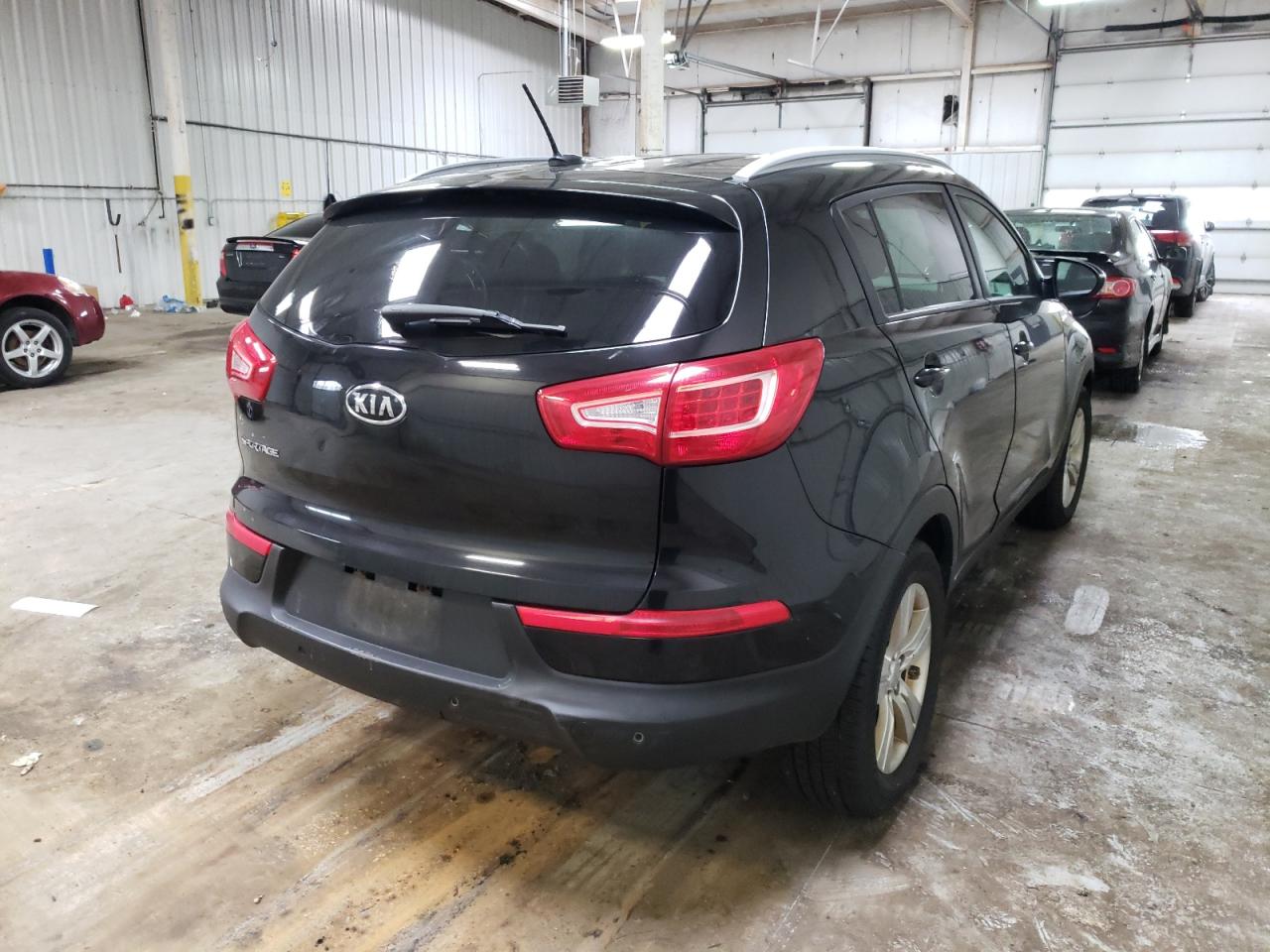 Photo 4 from auction – 2012 KIA SPORTAGE L with VIN KNDPBCA26C7234004