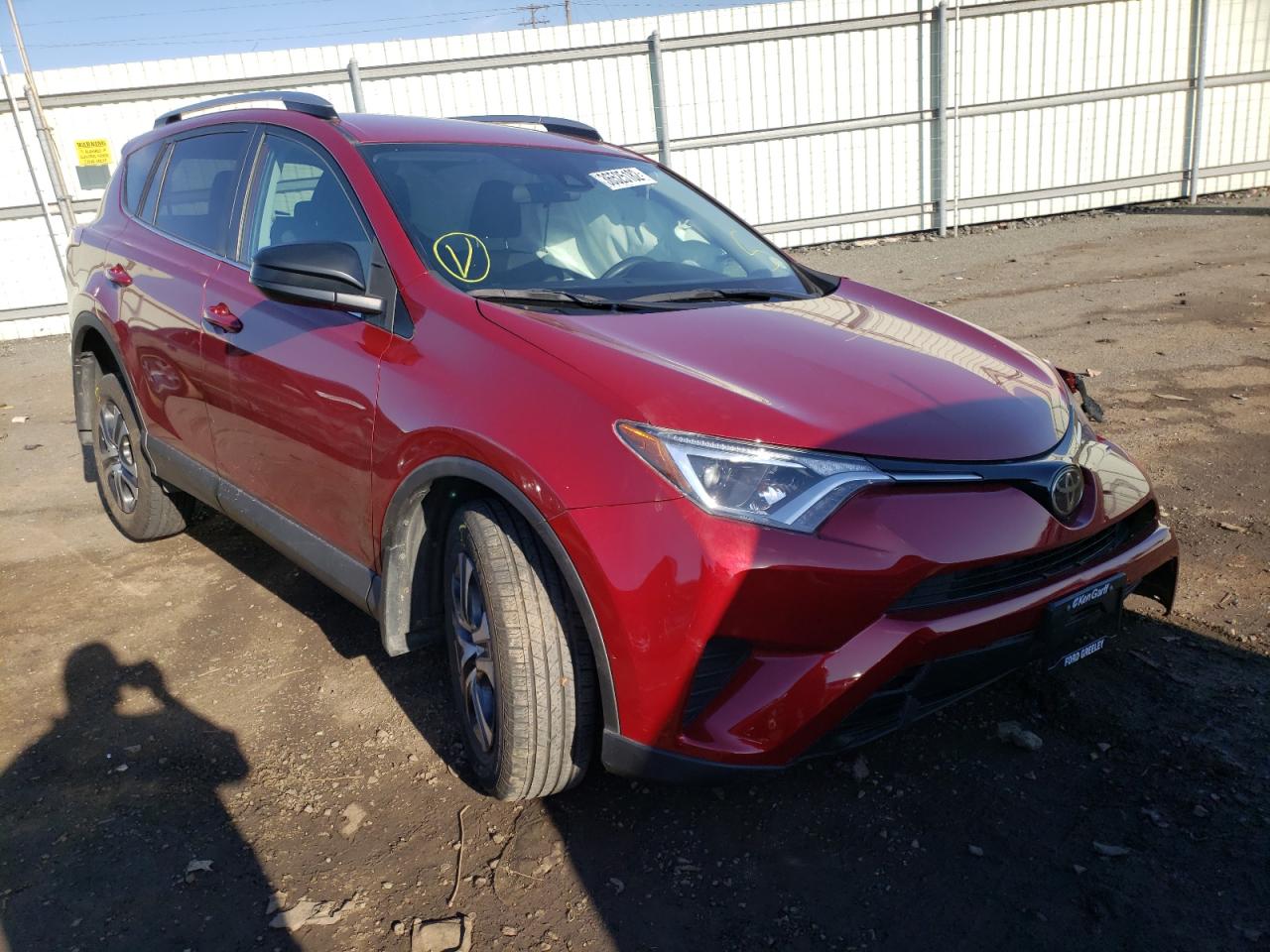 TOYOTA RAV4 LE 2018 with VIN 2T3BFREV7JW843531 - Photo from auction