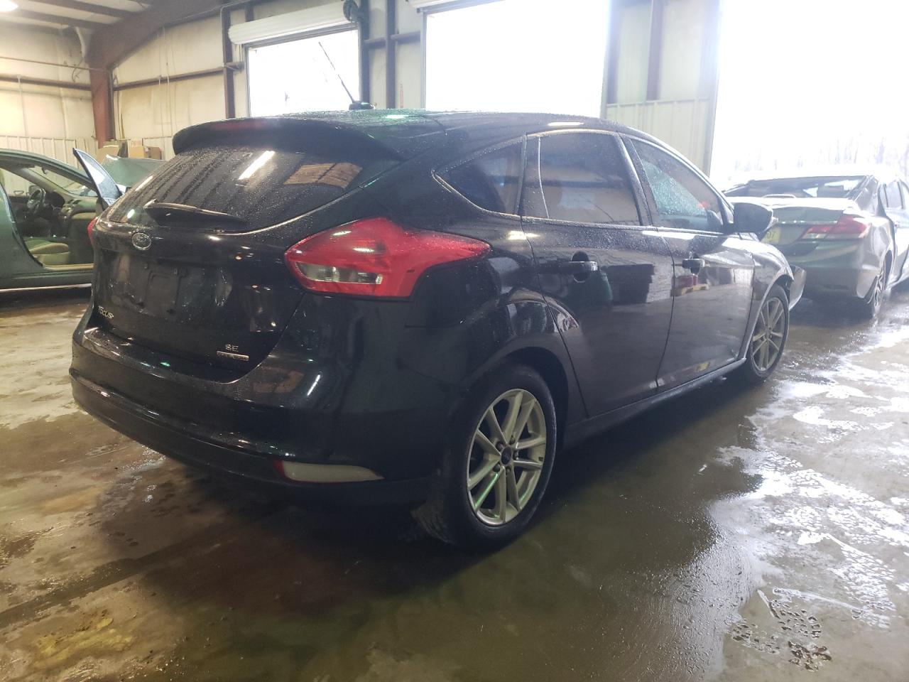 Photo 4 from auction – 2015 FORD FOCUS SE with VIN 1FADP3K27FL262933