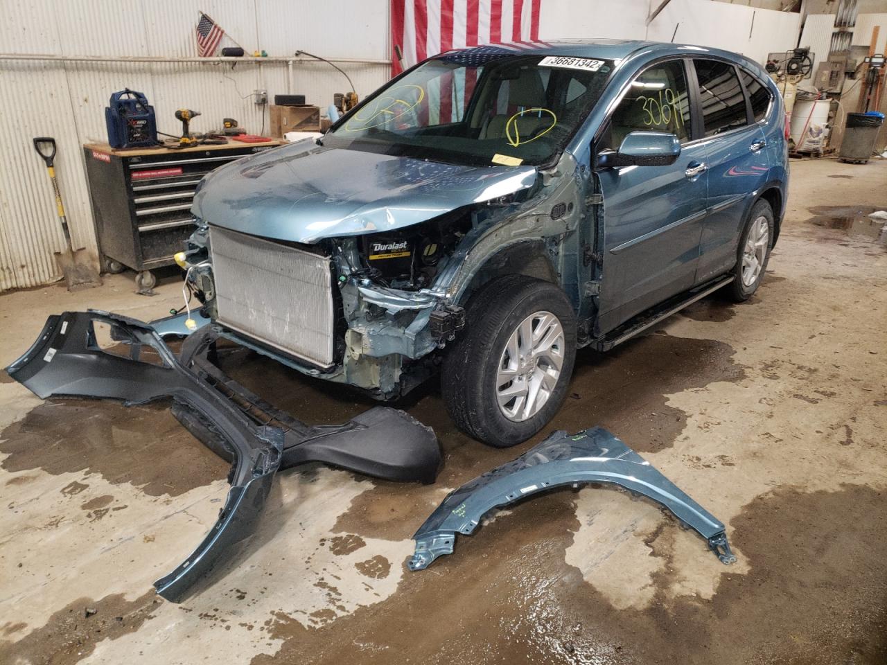 Photo 2 from auction – 2015 HONDA CR-V EX with VIN 2HKRM4H58FH688568