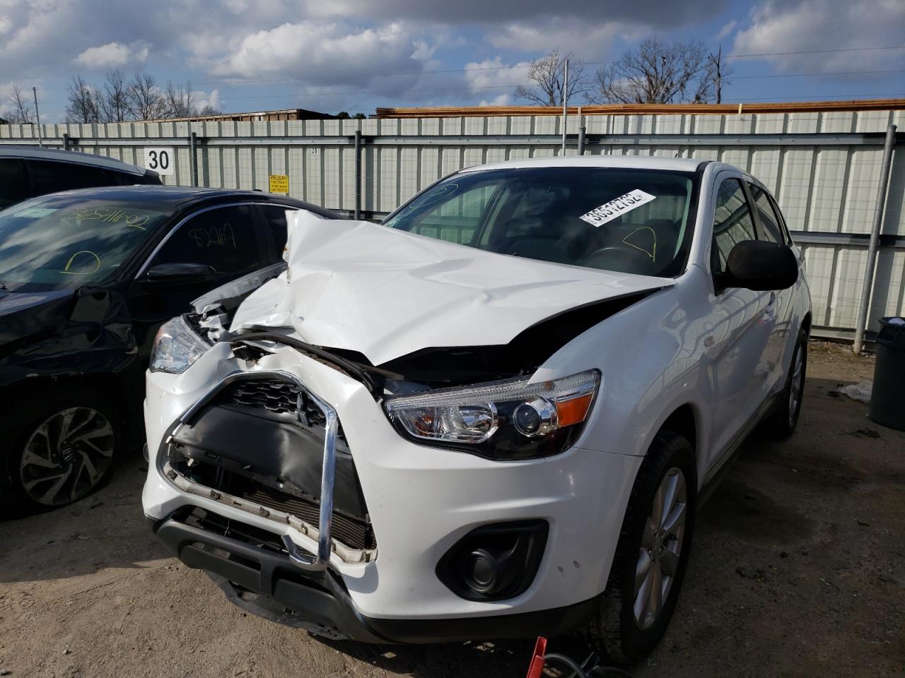 Photo 2 from auction – 2015 MITSUBISHI OUTLANDER with VIN 4A4AP3AW7FE058227