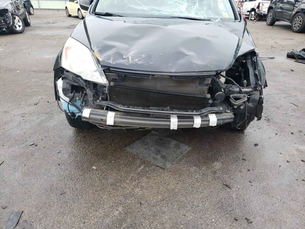 Photo 9 from auction – 2011 HONDA CR-V EX with VIN 5J6RE4H52BL093017