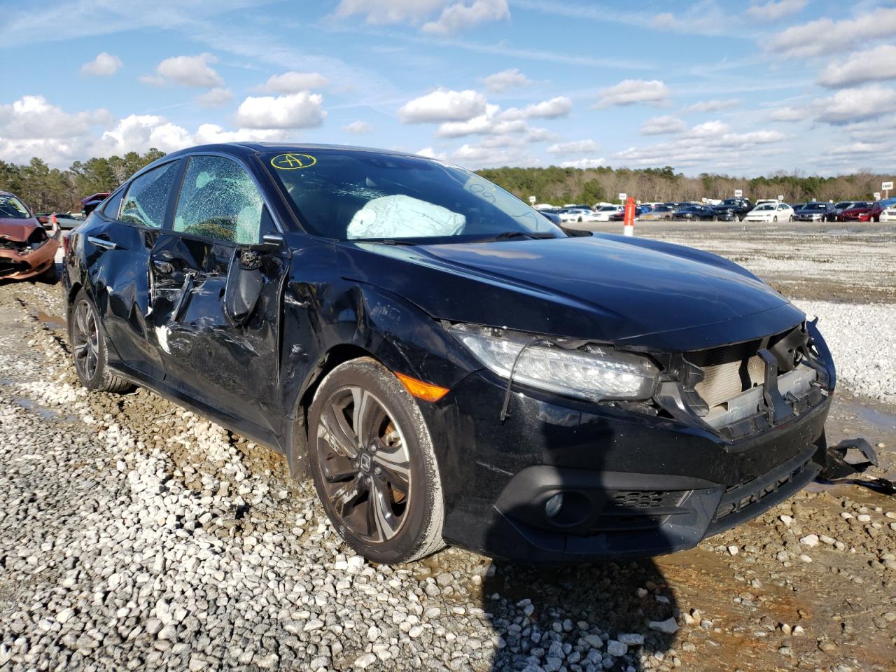 HONDA CIVIC TOUR 2016 with VIN 2HGFC1F94GH656058 - Photo from auction