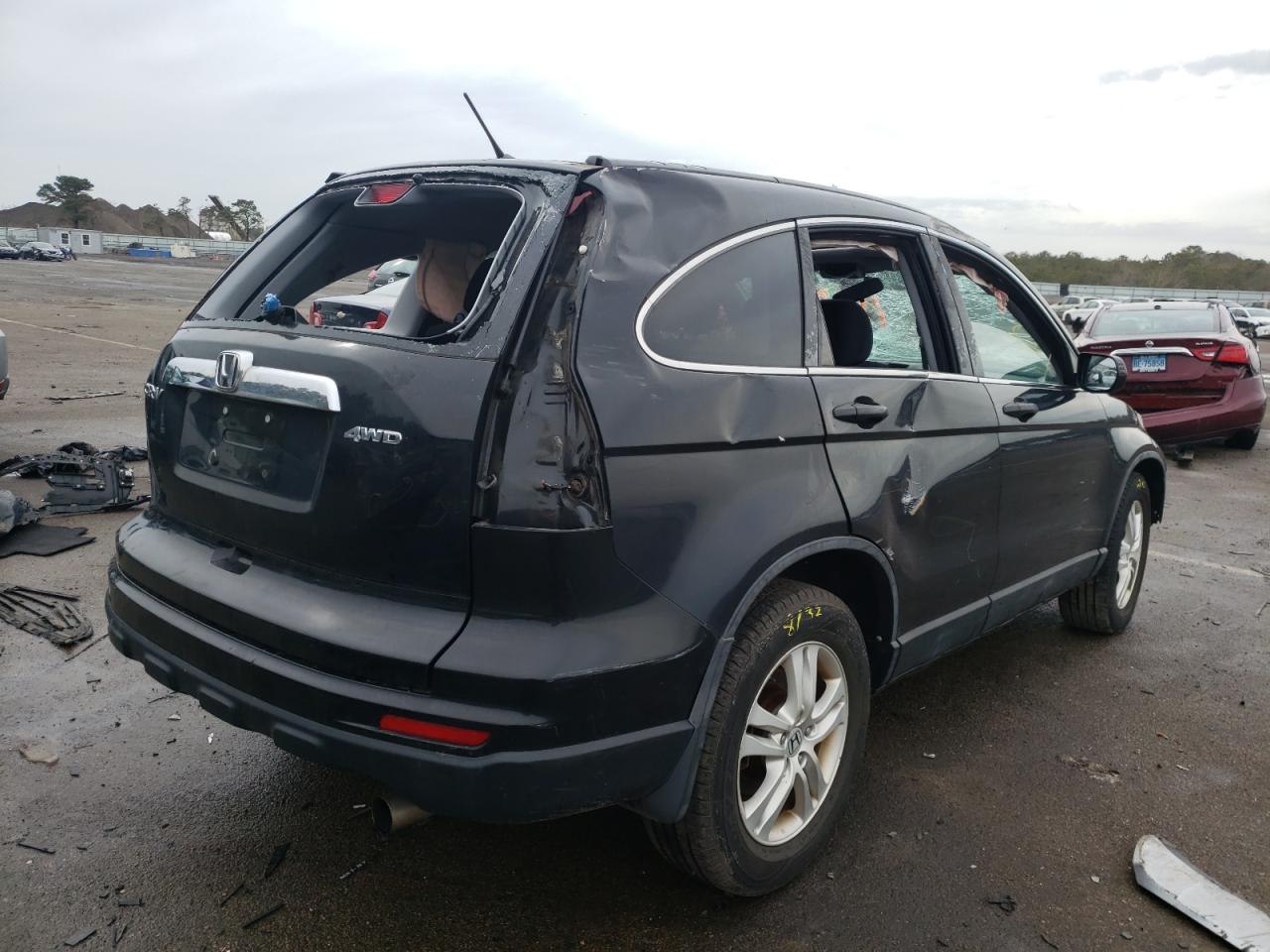 Photo 4 from auction – 2011 HONDA CR-V EX with VIN 5J6RE4H52BL093017