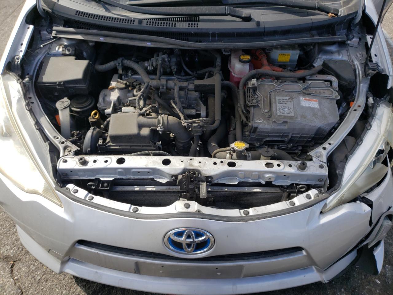 Photo 7 from auction – 2014 TOYOTA PRIUS C with VIN JTDKDTB35E1565951