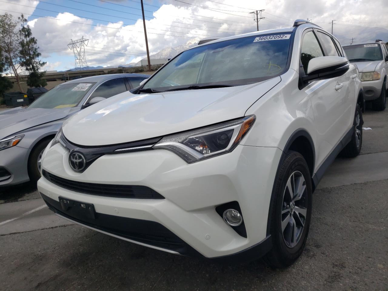 Photo 2 from auction – 2016 TOYOTA RAV4 XLE with VIN JTMWFREV2GJ065180