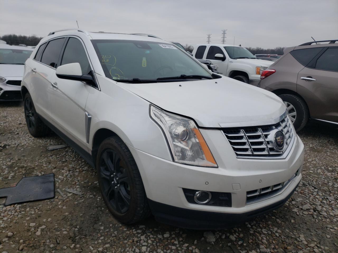 CADILLAC SRX PREMIU 2015 with VIN 3GYFNDE32FS594141 - Photo from auction