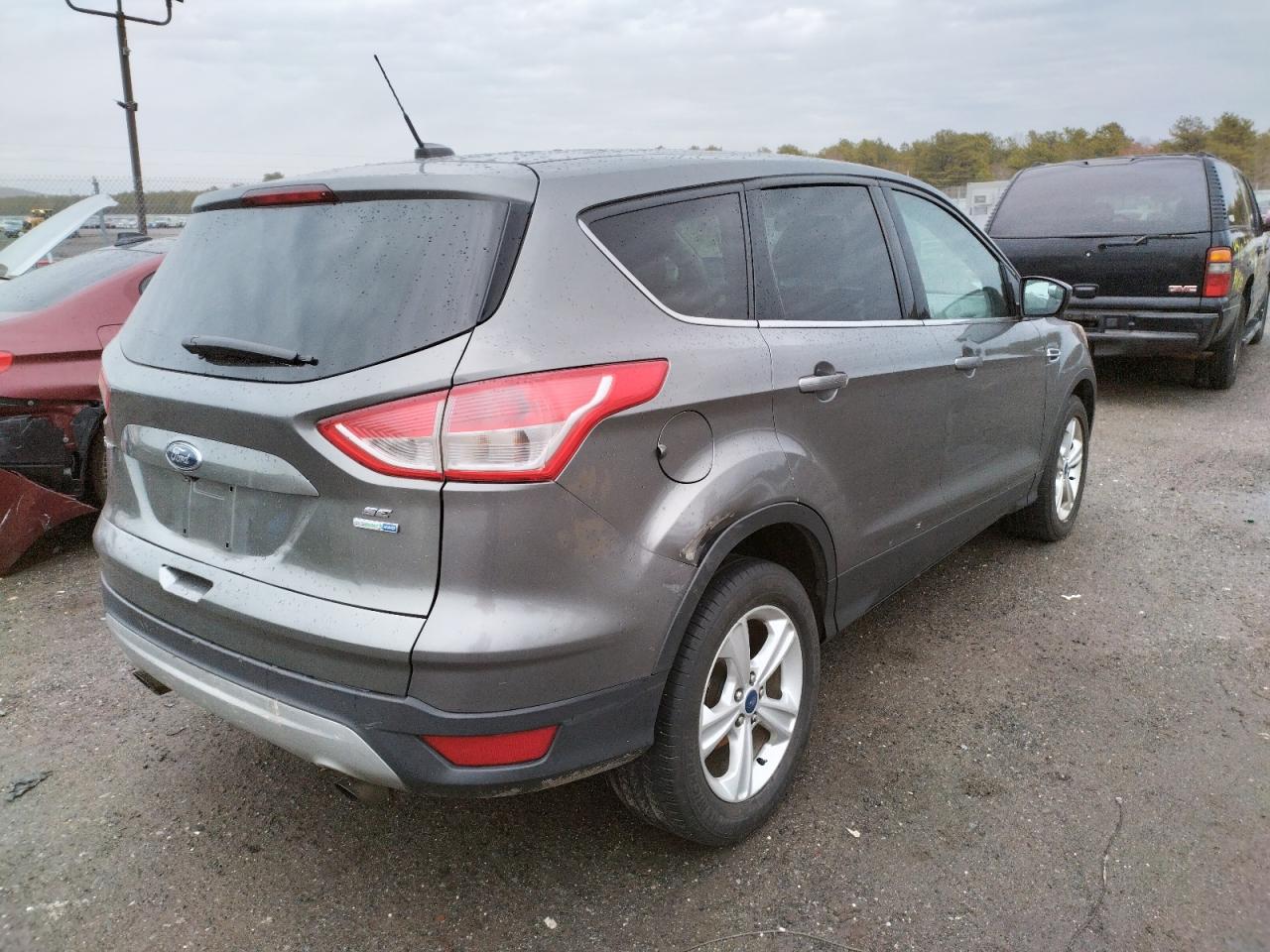 Photo 4 from auction – 2014 FORD ESCAPE SE with VIN 1FMCU9GX1EUD84293