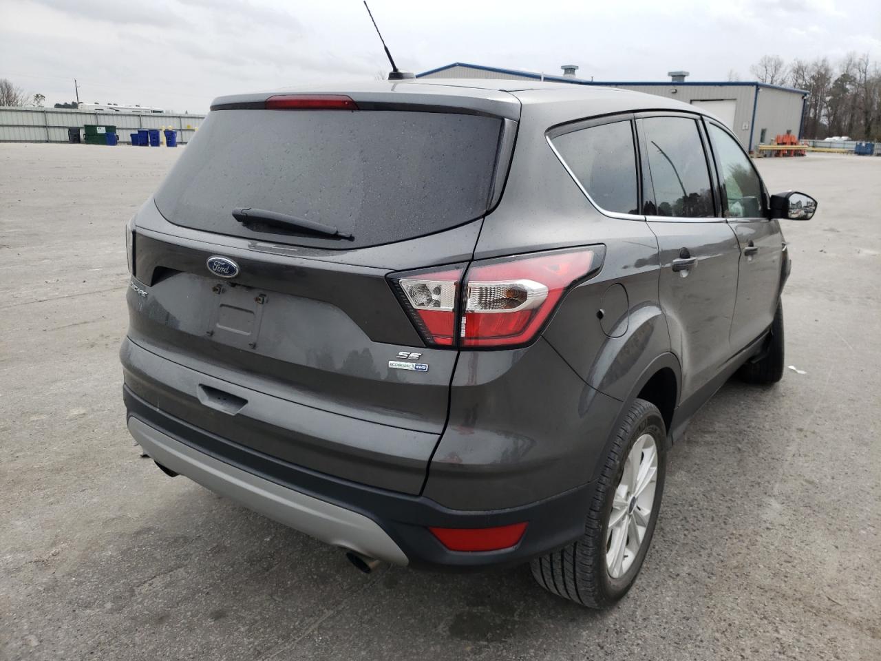 Photo 4 from auction – 2017 FORD ESCAPE SE with VIN 1FMCU9GD4HUB89413