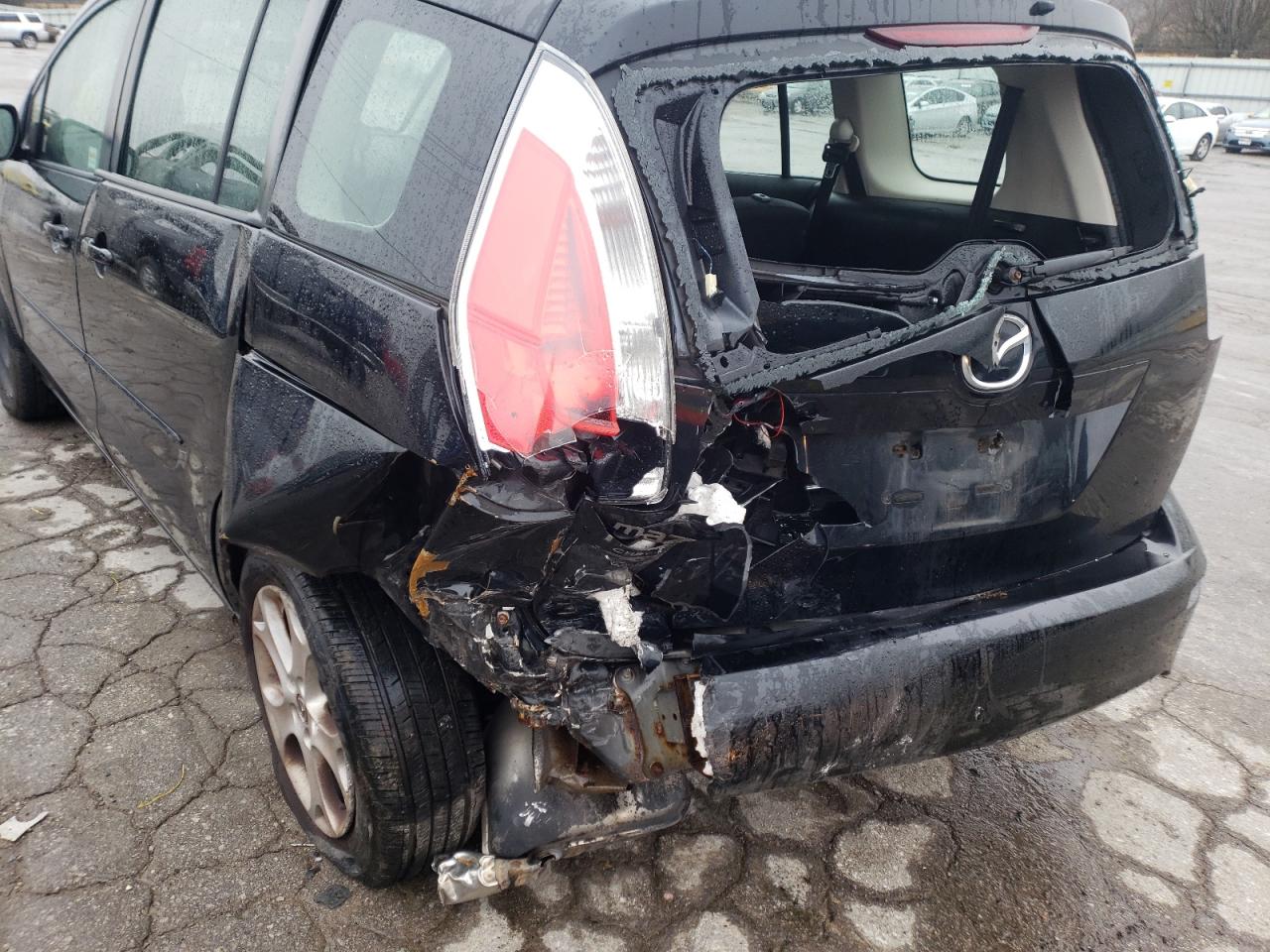 Photo 9 from auction – 2009 MAZDA 5 with VIN JM1CR293390333723