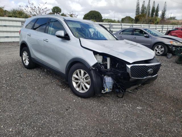 KIA SORENTO LX 2016 with VIN 5XYPG4A30GG116992 - Photo from auction