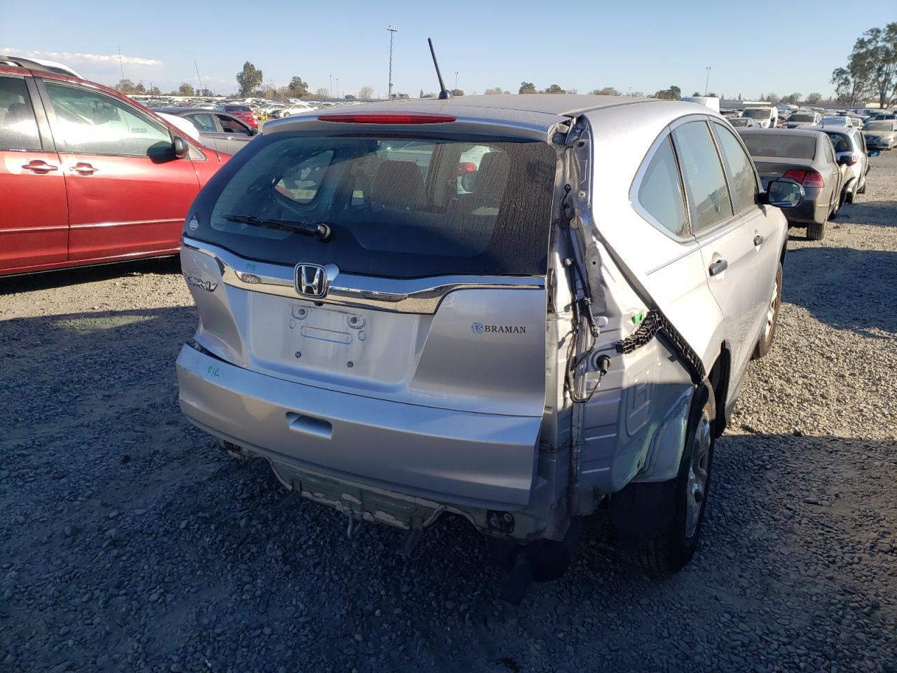 Photo 4 from auction – 2016 HONDA CR-V LX with VIN 2HKRM3H33GH569305