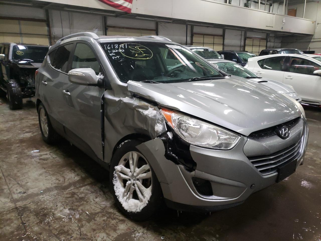 HYUNDAI TUCSON GLS 2012 with VIN KM8JUCAC4CU544691 - Photo from auction