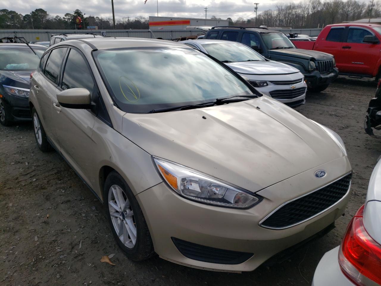 FORD FOCUS SE 2018 with VIN 1FADP3K21JL245358 - Photo from auction