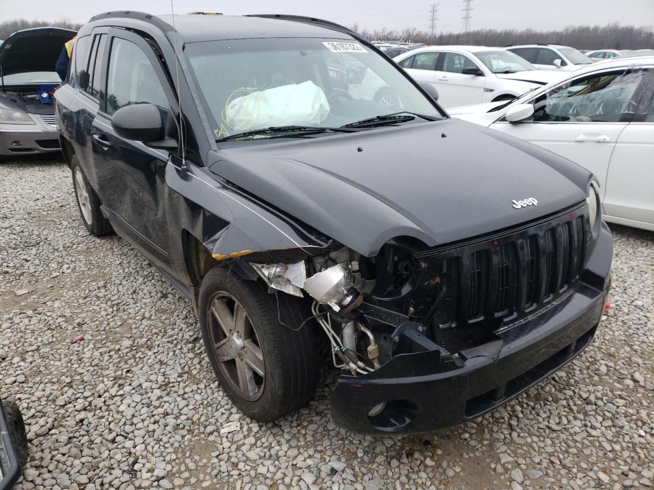 JEEP COMPASS SP 2010 with VIN 1J4NT4FB0AD521673 - Photo from auction