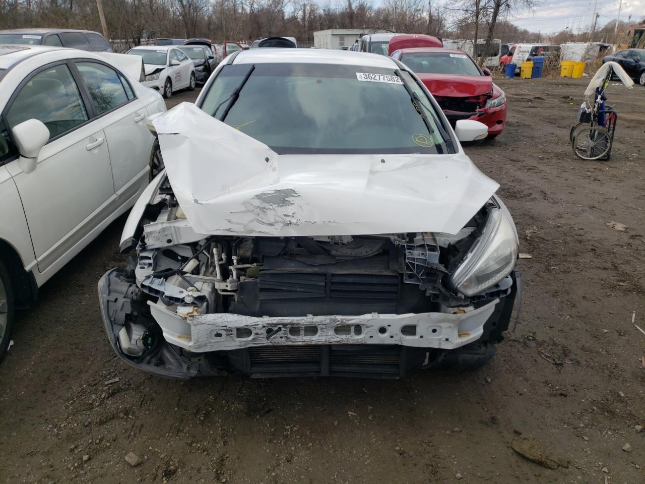 Photo 9 from auction – 2015 FORD FOCUS SE with VIN 1FADP3F26FL205116