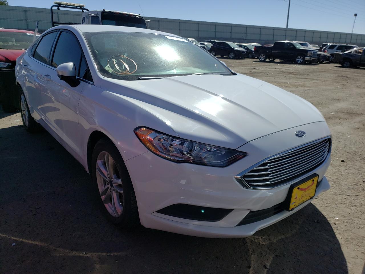 FORD FUSION SE 2018 with VIN 3FA6P0HDXJR218290 - Photo from auction