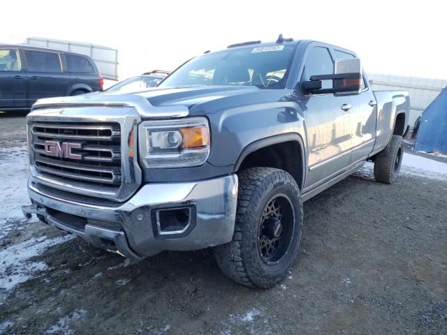 Photo 2 from auction – 2015 GMC SIERRA K35 with VIN 1GT423E89FF609573