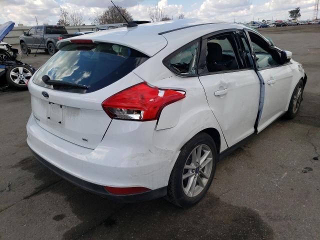 Photo 4 from auction – 2016 FORD FOCUS SE with VIN 1FADP3K29GL352036