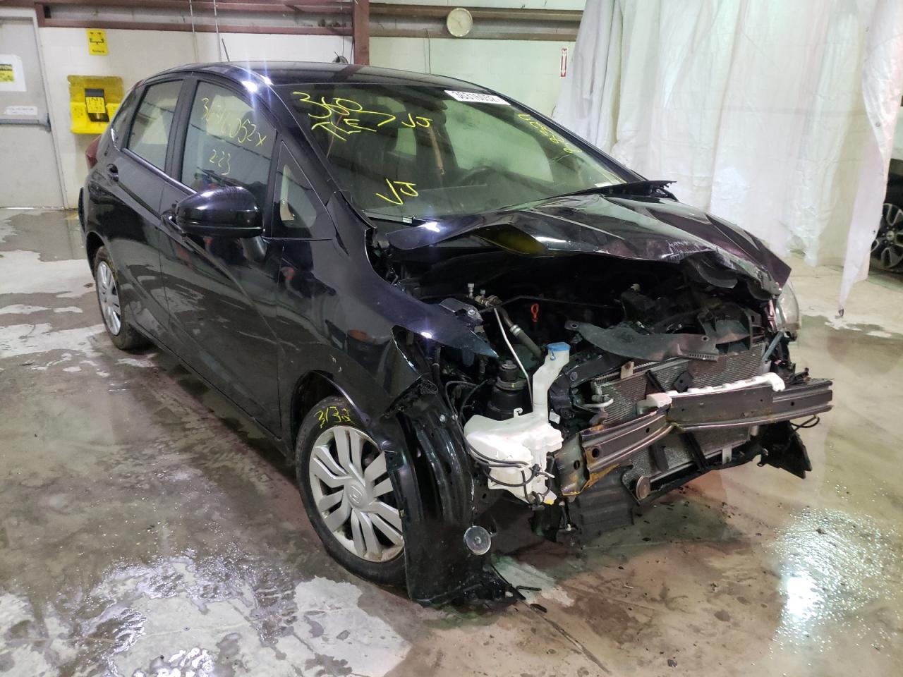HONDA FIT LX 2017 with VIN JHMGK5H52HS020285 - Photo from auction
