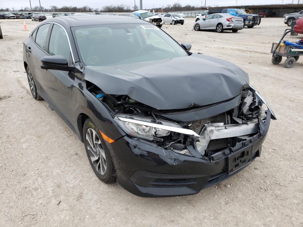 HONDA CIVIC EX 2018 with VIN 2HGFC2F76JH528500 - Photo from auction
