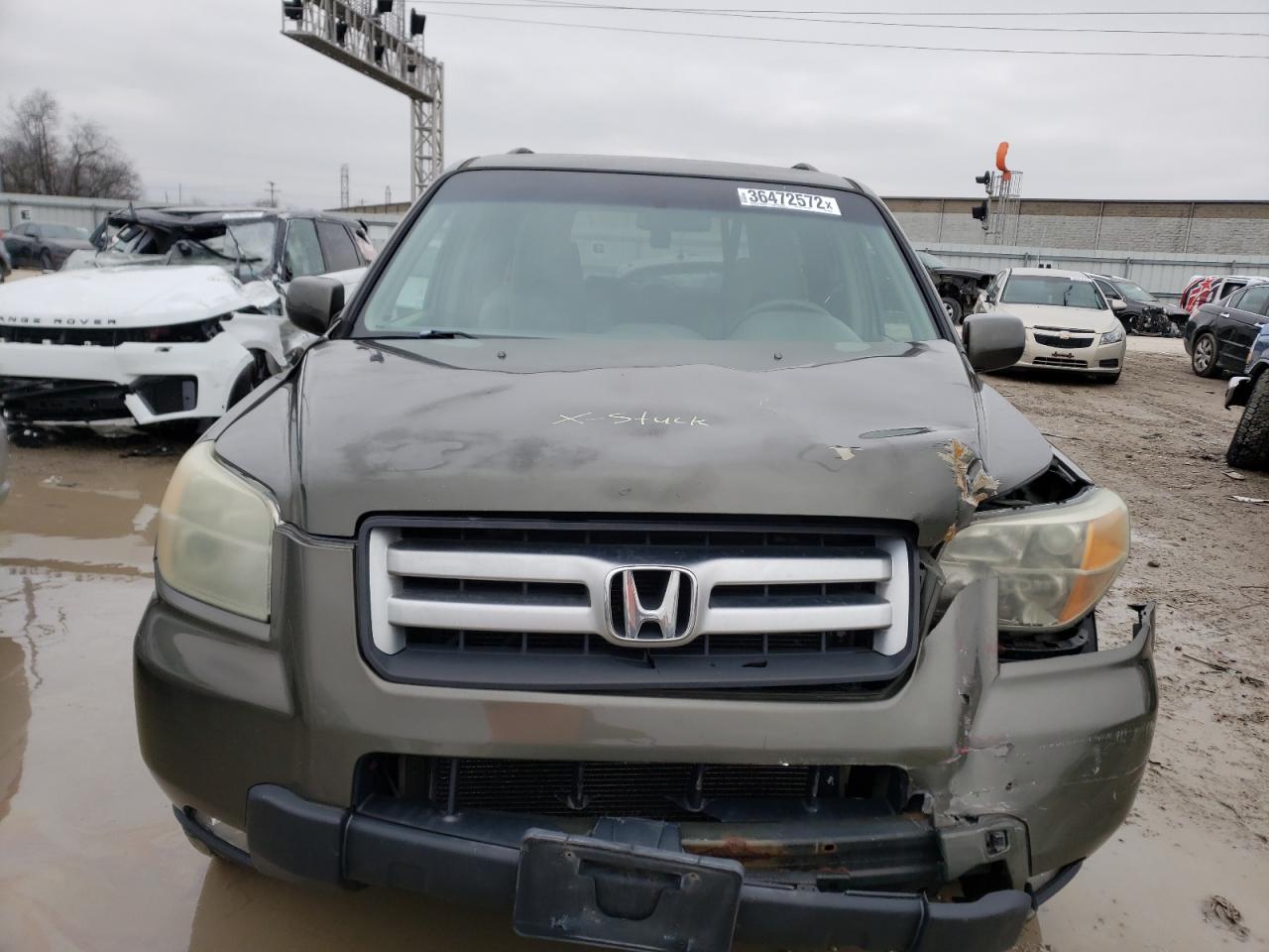Photo 9 from auction – 2006 HONDA PILOT EX with VIN 5FNYF18446B004559