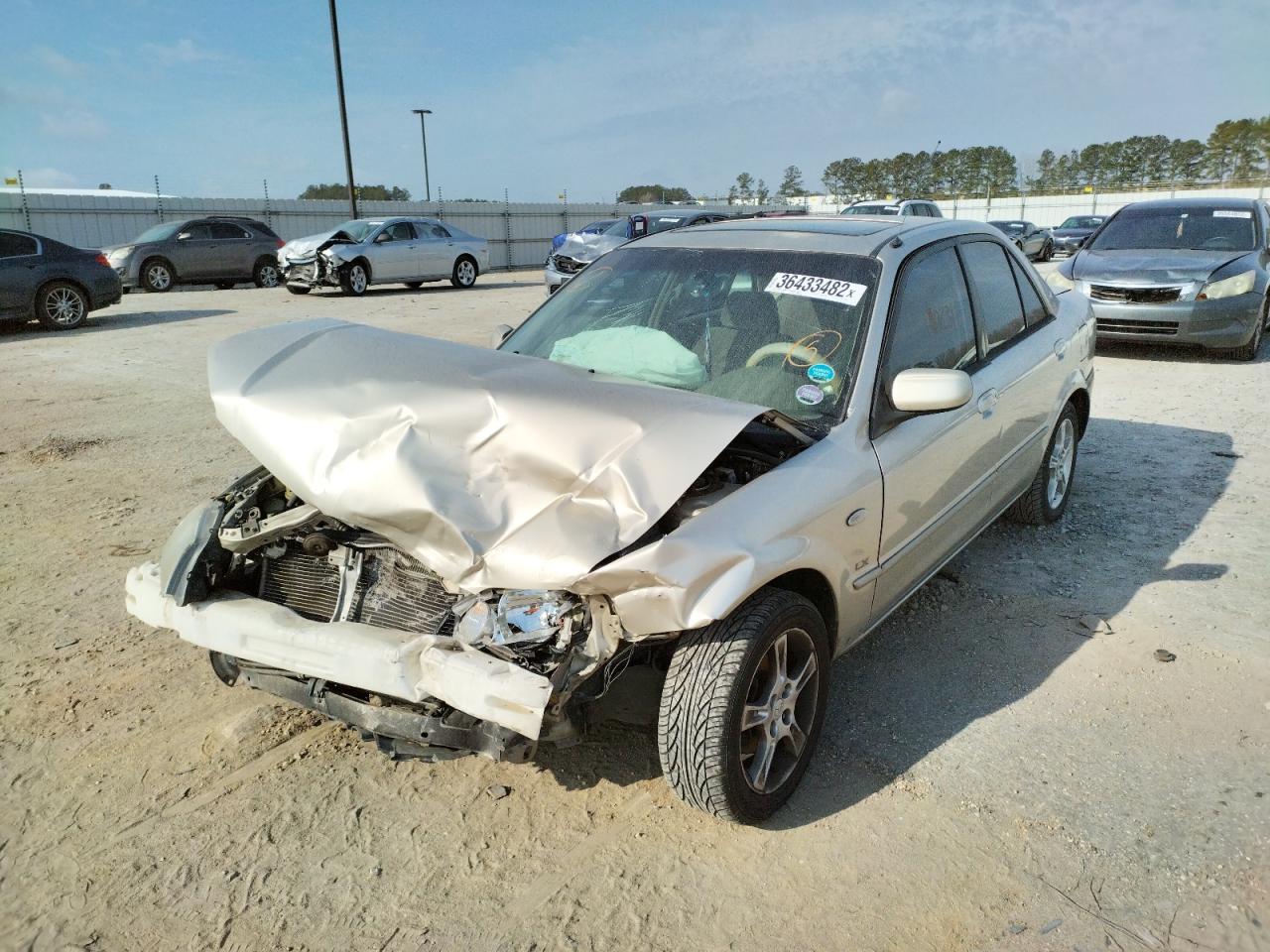 Photo 2 from auction – 2003 MAZDA PROTEGE DX with VIN JM1BJ225630126846