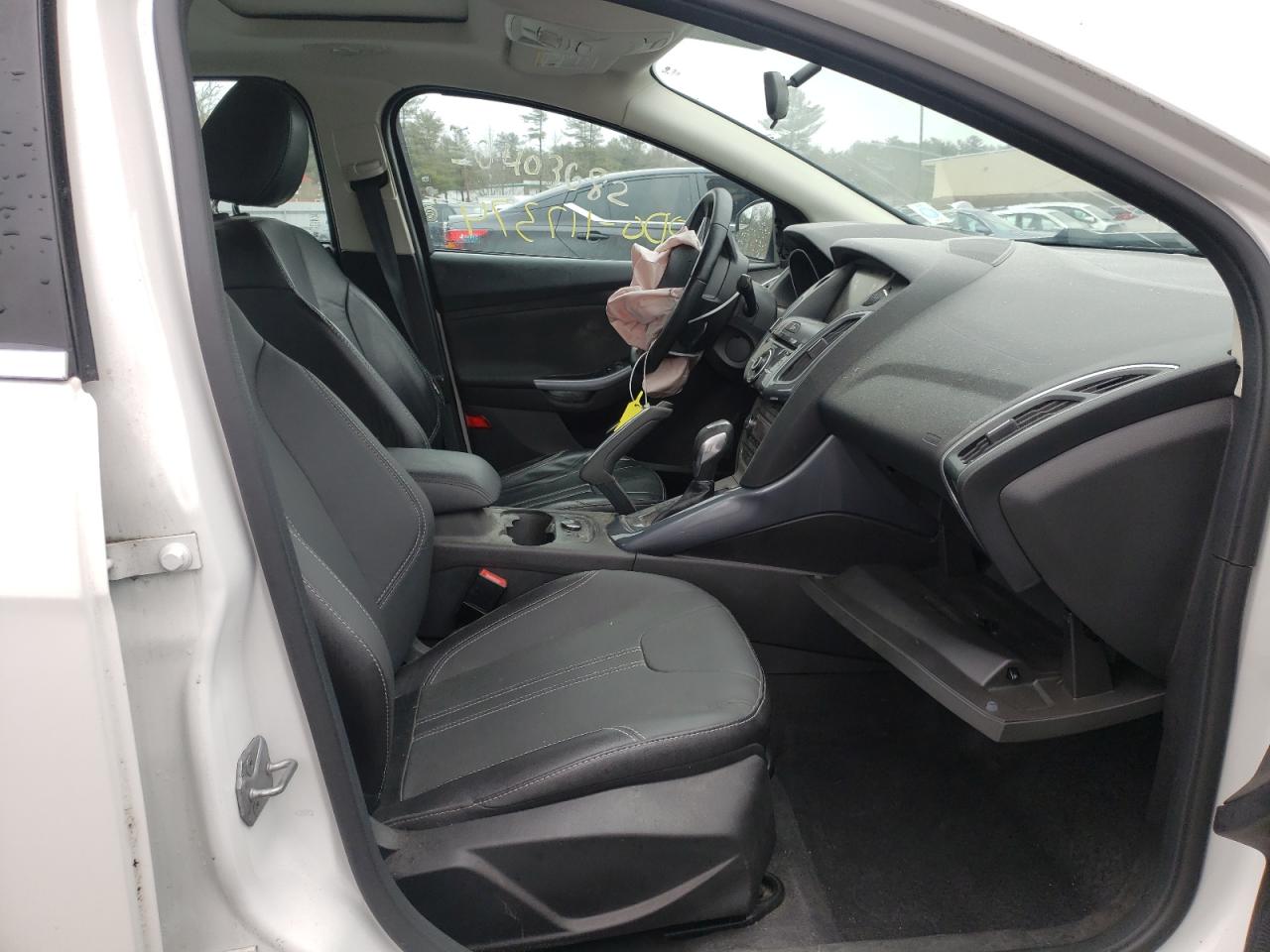 Photo 5 from auction – 2014 FORD FOCUS TITA with VIN 1FADP3J2XEL101671