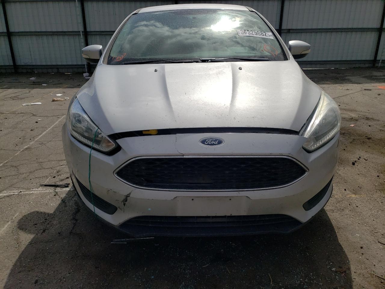 Photo 9 from auction – 2016 FORD FOCUS SE with VIN 1FADP3F20GL289872