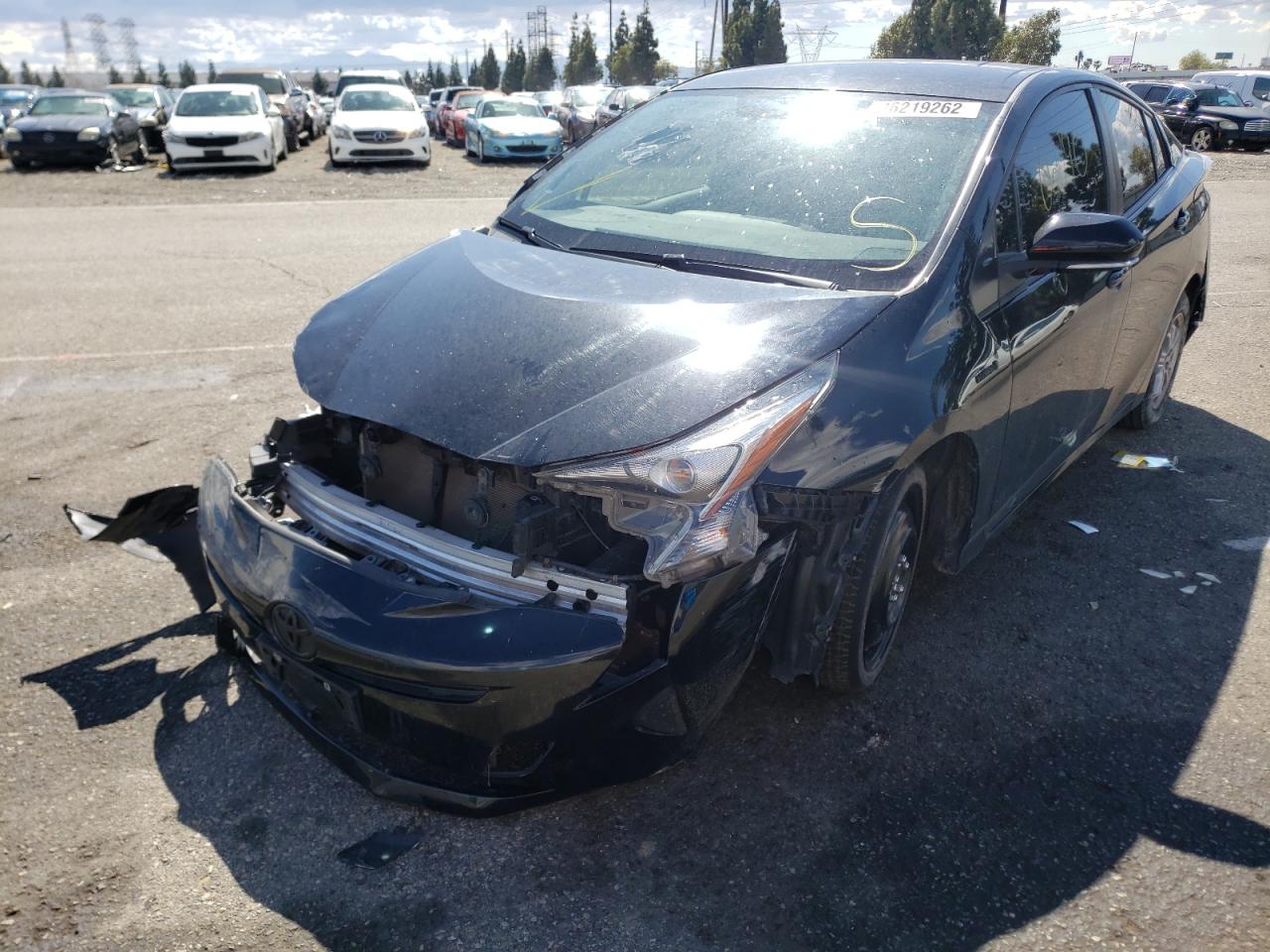 Photo 2 from auction – 2016 TOYOTA PRIUS with VIN JTDKBRFUXG3012201