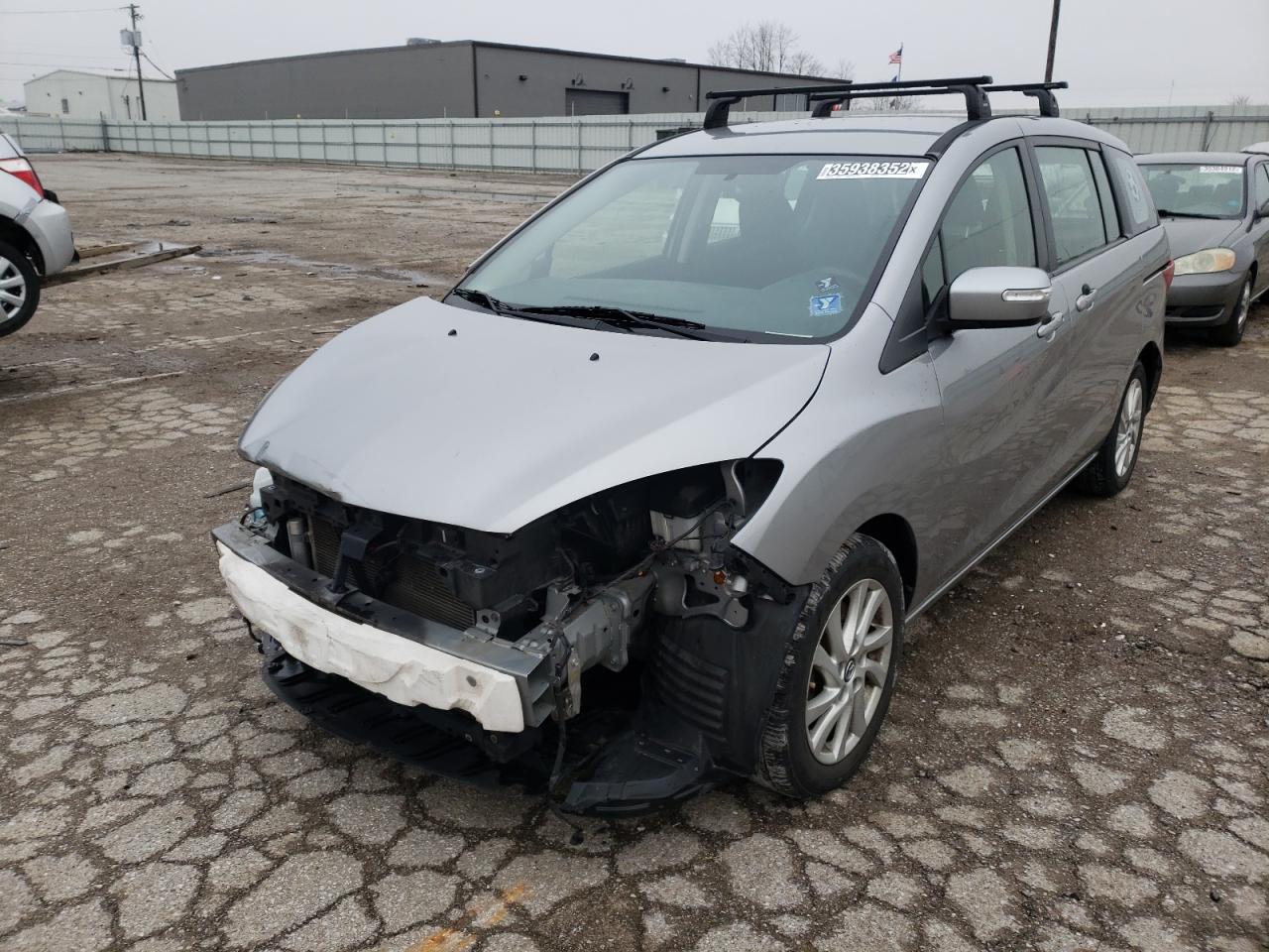 Photo 2 from auction – 2013 MAZDA 5 with VIN JM1CW2BLXD0159113