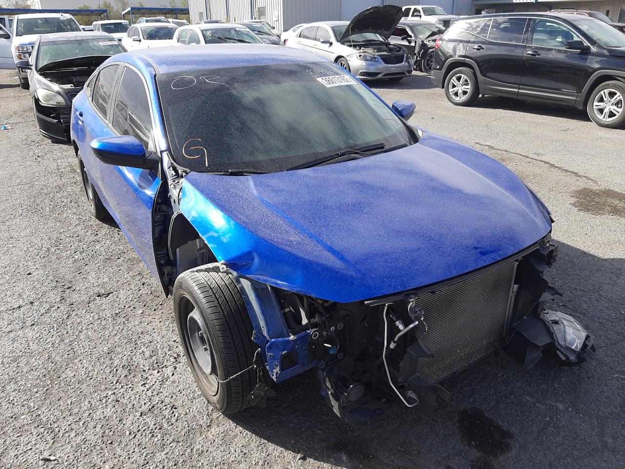 HONDA CIVIC LX 2017 with VIN 19XFC2F59HE025823 - Photo from auction