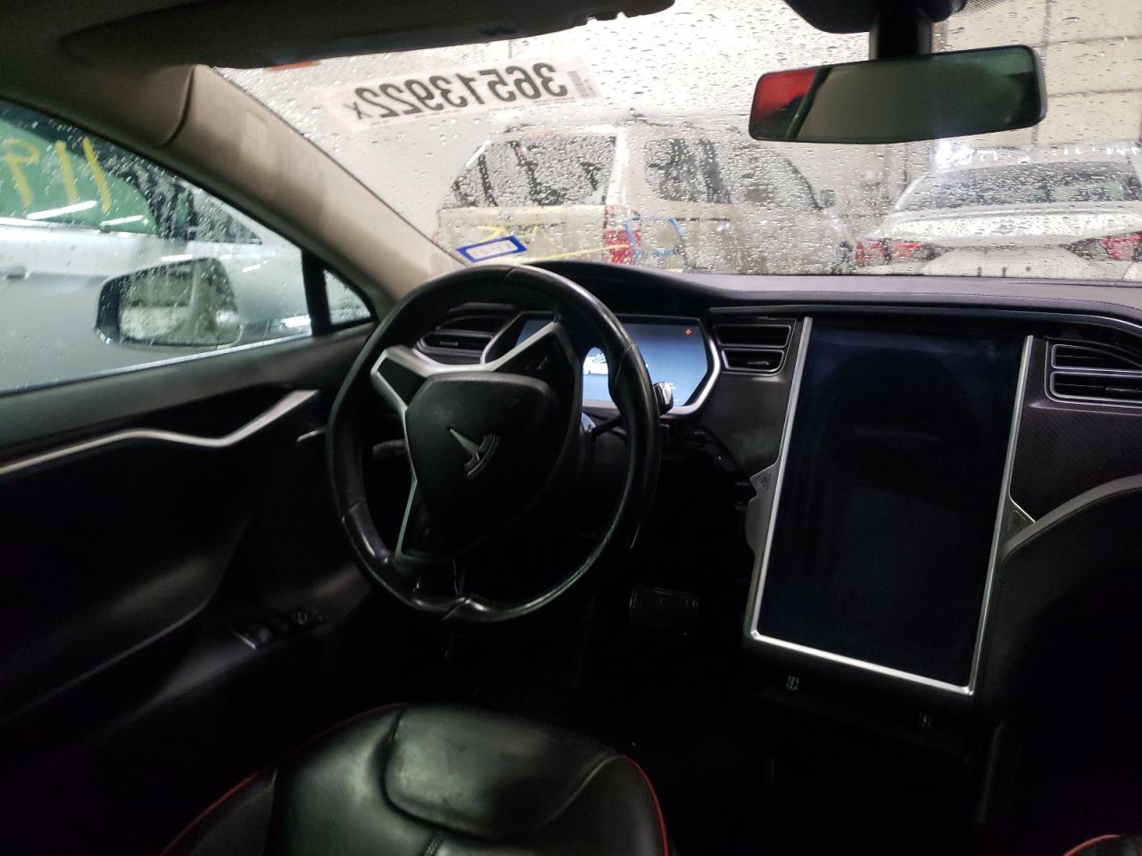 Photo 9 from auction – 2014 TESLA MODEL S with VIN 5YJSA1H1XEFP32086