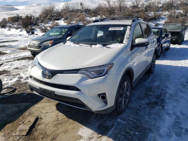 Photo 2 from auction – 2018 TOYOTA RAV4 LIMIT with VIN JTMDFREV7JJ747891